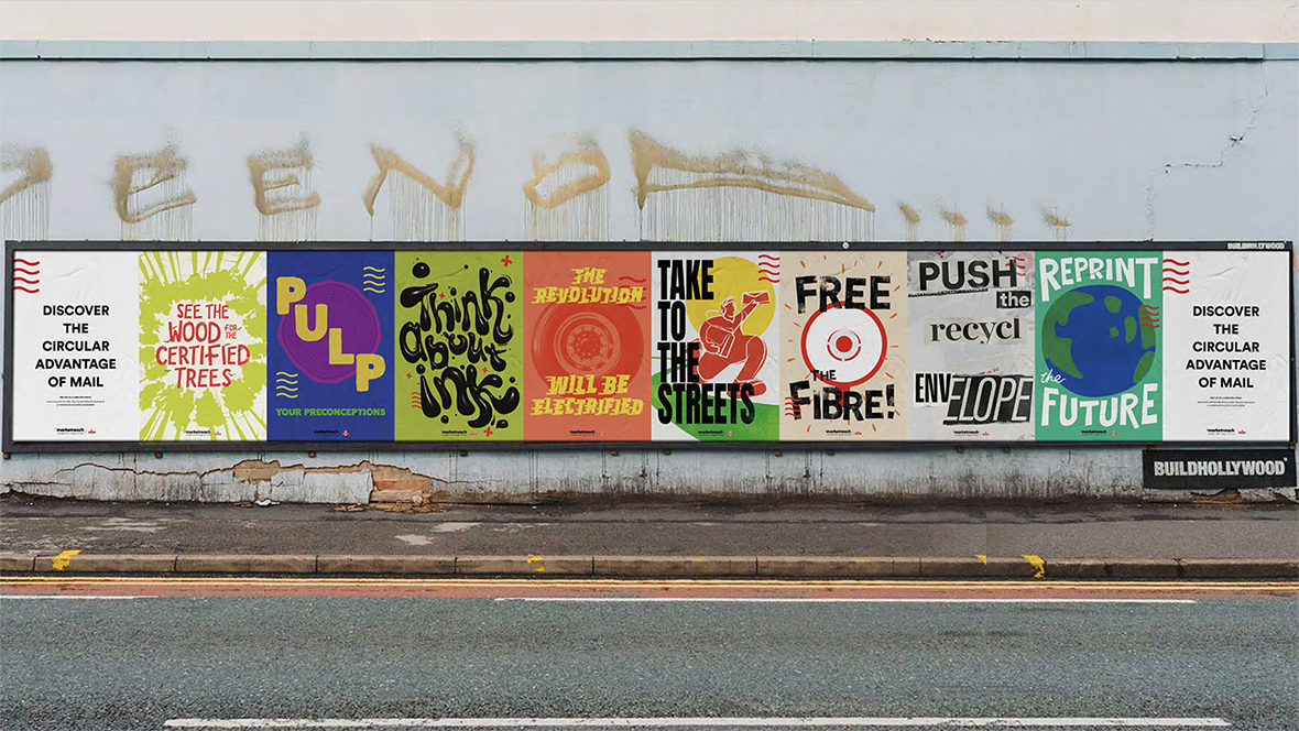 Royal Mail - various posters in a long line on a wall outside with pavement and graffiti above them.